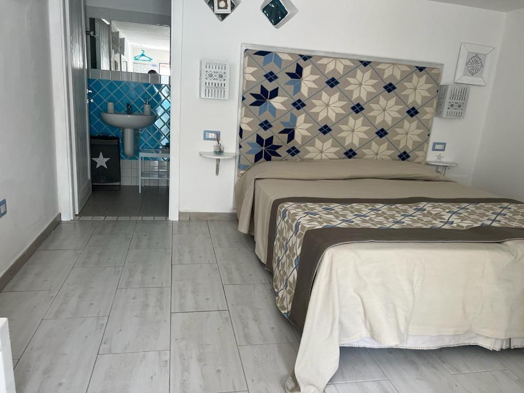 Rooms Apartaments Santa Teresa คาโป เทสตา ภายนอก รูปภาพ
