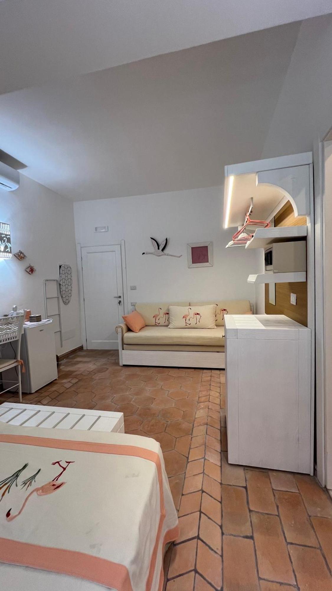 Rooms Apartaments Santa Teresa คาโป เทสตา ภายนอก รูปภาพ